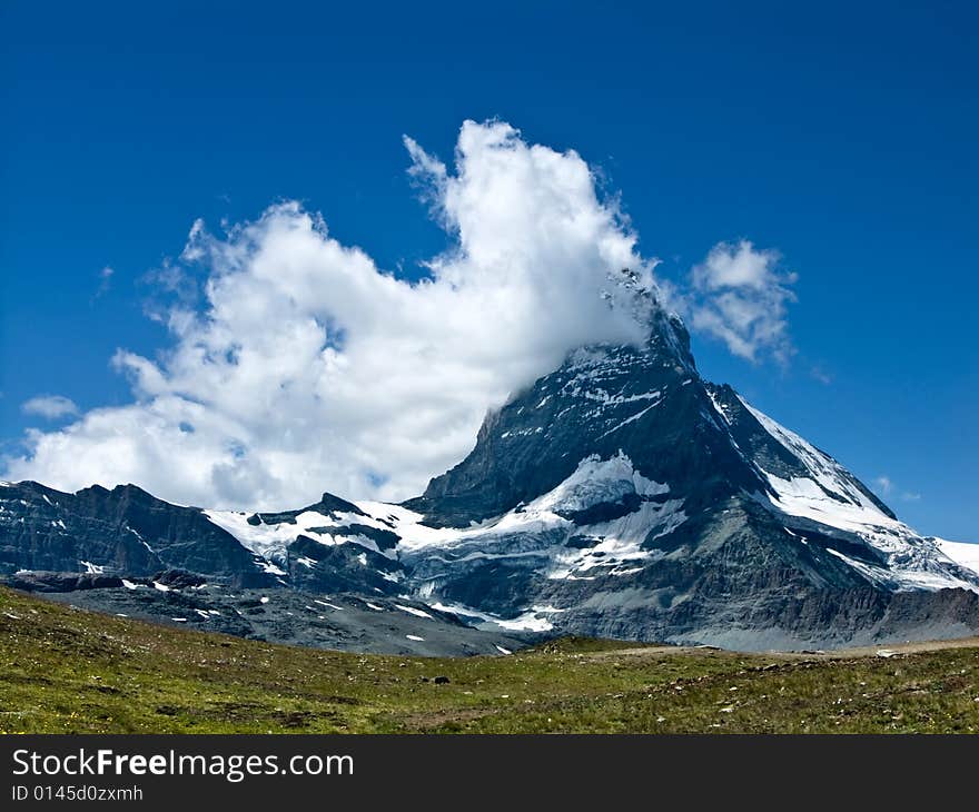 Matterhorn (Monte Cervino) is one of the highest summits from Europe (4478 m altitude) at the border between Switzerland and Italy. Matterhorn (Monte Cervino) is one of the highest summits from Europe (4478 m altitude) at the border between Switzerland and Italy.