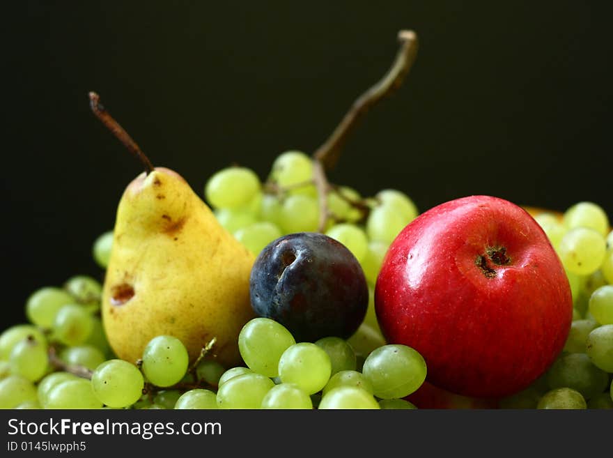 Juicy, fresh fruit on a black background. Juicy, fresh fruit on a black background