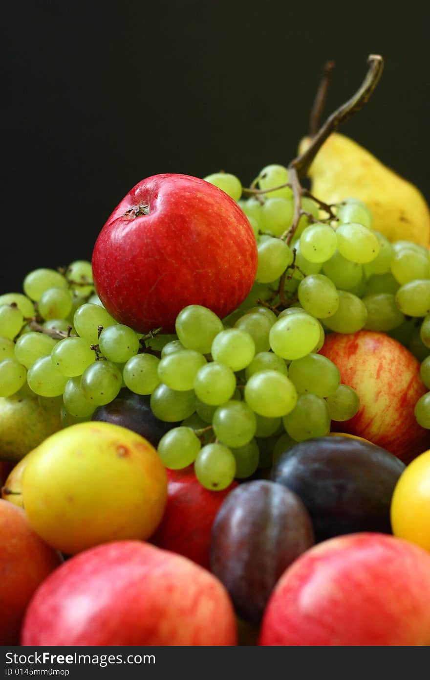 Juicy, fresh fruit on a black background. Juicy, fresh fruit on a black background