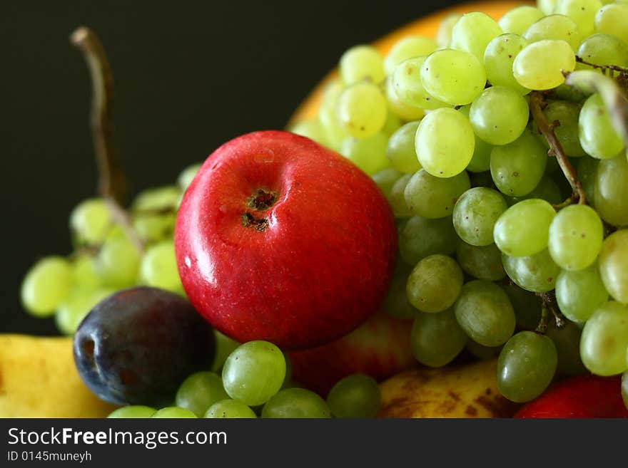 Juicy, fresh fruit on a black background. Juicy, fresh fruit on a black background