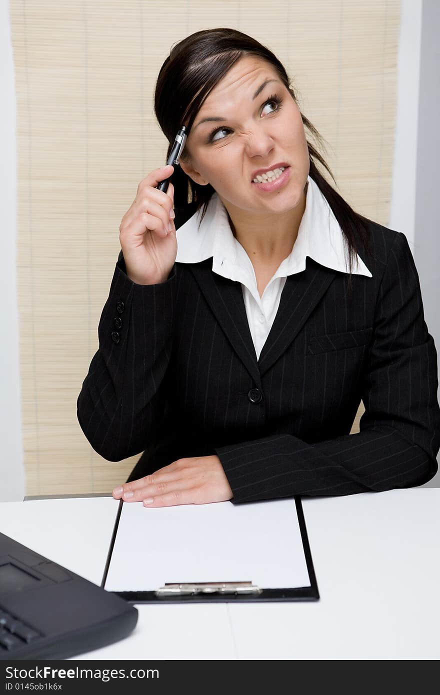 Happy and attractive brunette businesswoman