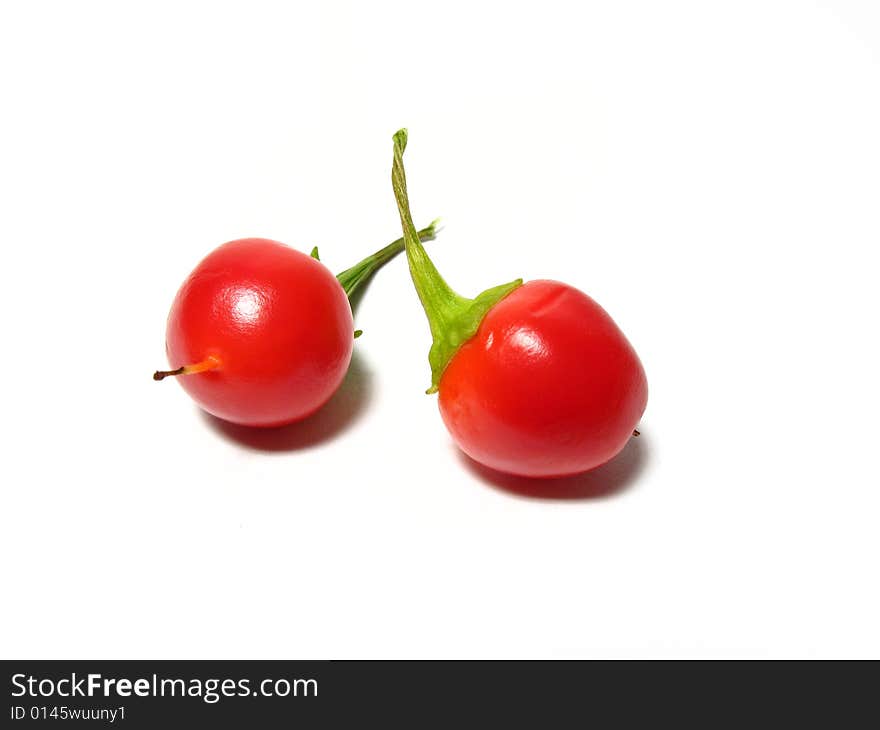 Detail of two red chillis