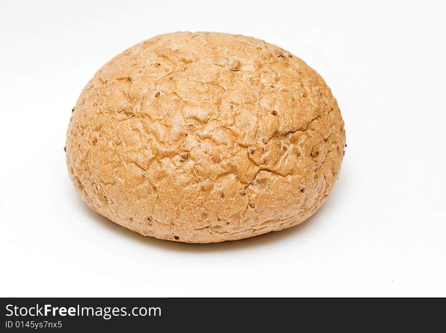 Round bread on neutral white background