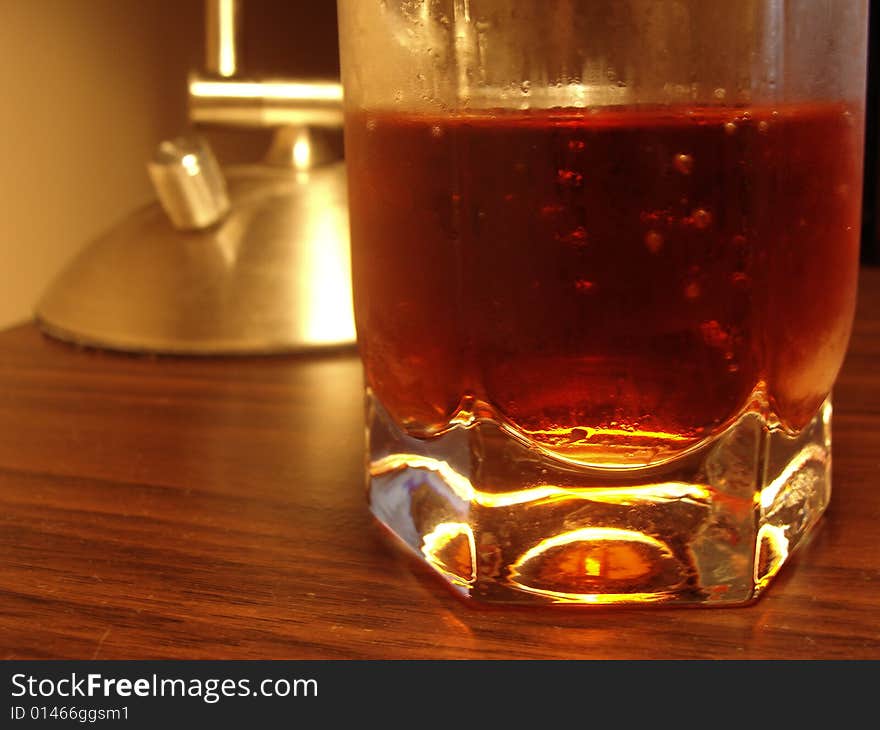 Glass on the table with fresh water. Glass on the table with fresh water