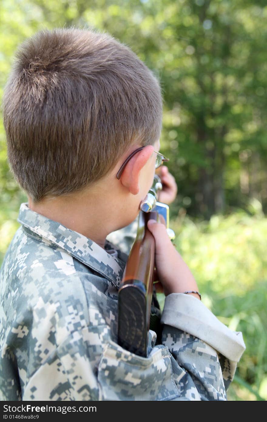 Young Boy Playing Soldier