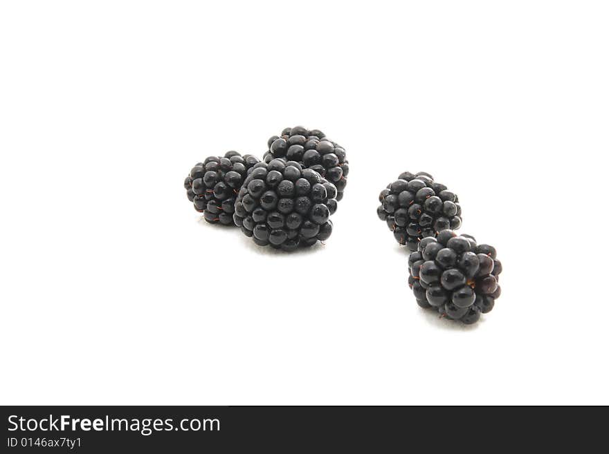 Group of plump, juicy blackberries ready to eat, isolated on white. Group of plump, juicy blackberries ready to eat, isolated on white