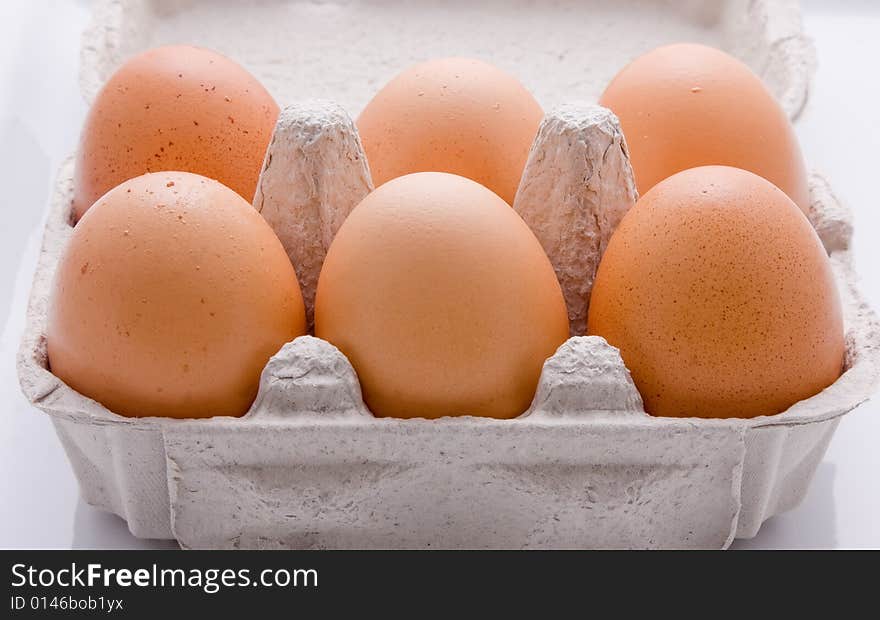 Half dozen eggs in a carton