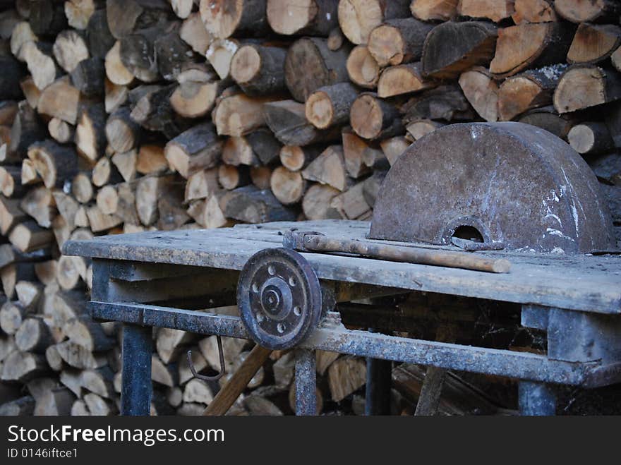 Fire wood and an old reciprocating saw. Fire wood and an old reciprocating saw