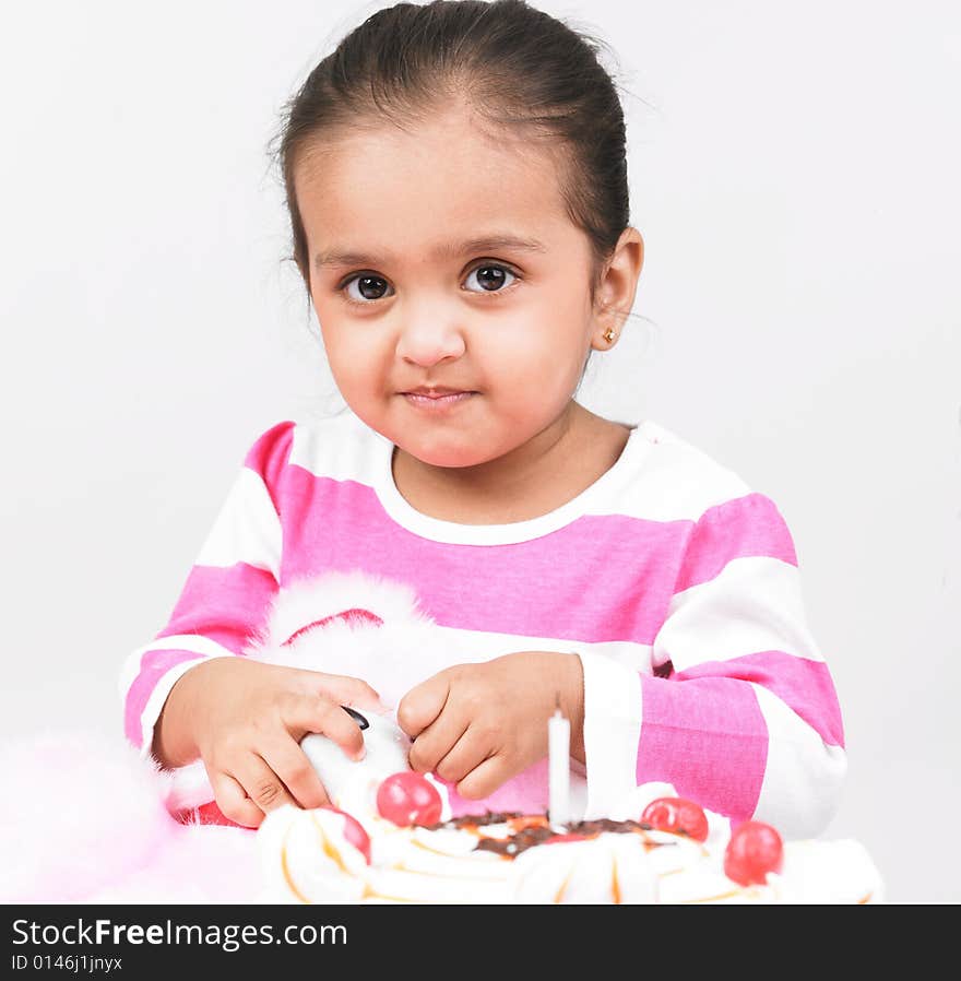 Girl in pink dress with cake. Girl in pink dress with cake