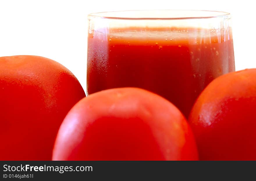 Fresh tomato juice and tomatoes on isolated background. Fresh tomato juice and tomatoes on isolated background.