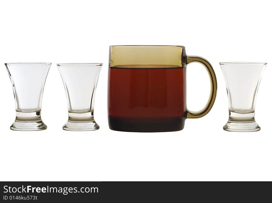 One full mug with three empty shots. One full mug with three empty shots