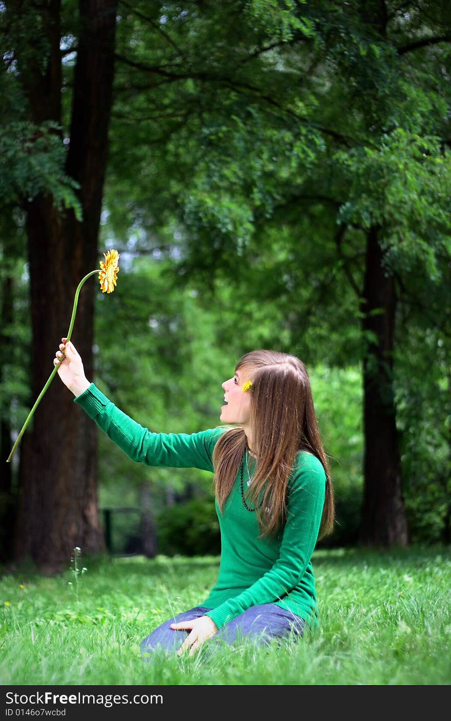 A Portrait Of A Gorgeous Girl On The Grass