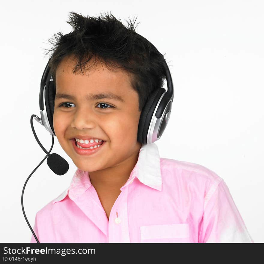 Asian boy wearing head phones