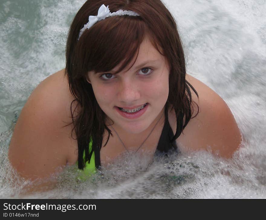 A picture of a cute young teen girl in a jacuzzi. A picture of a cute young teen girl in a jacuzzi.