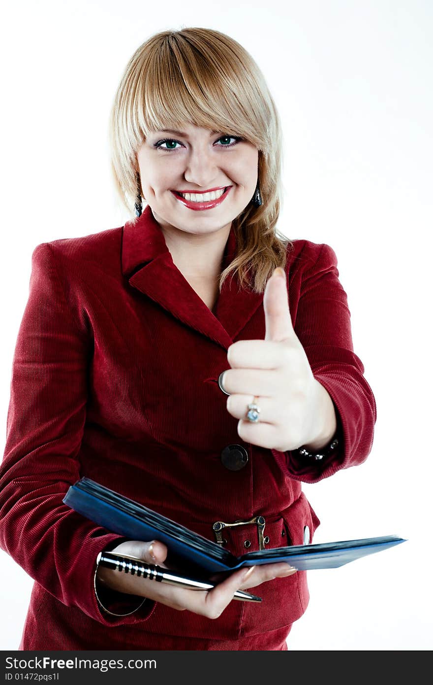 Joyful businesswoman with notebook in the hands