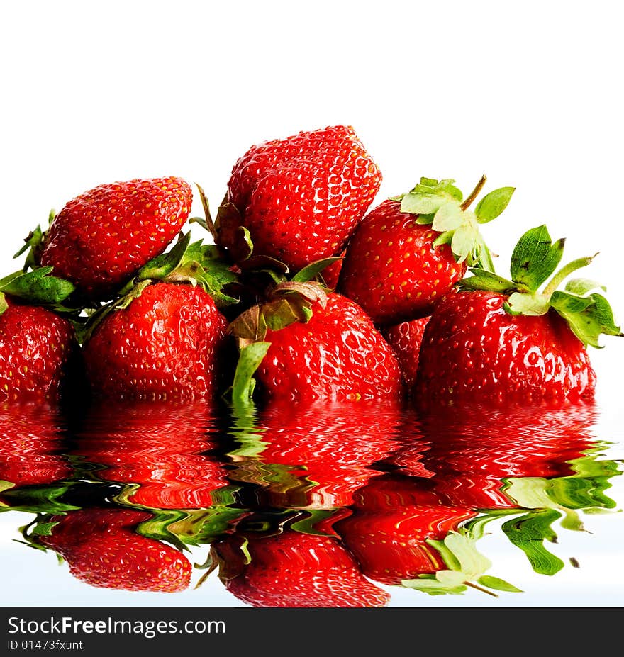 An image of fresh strawberries in water