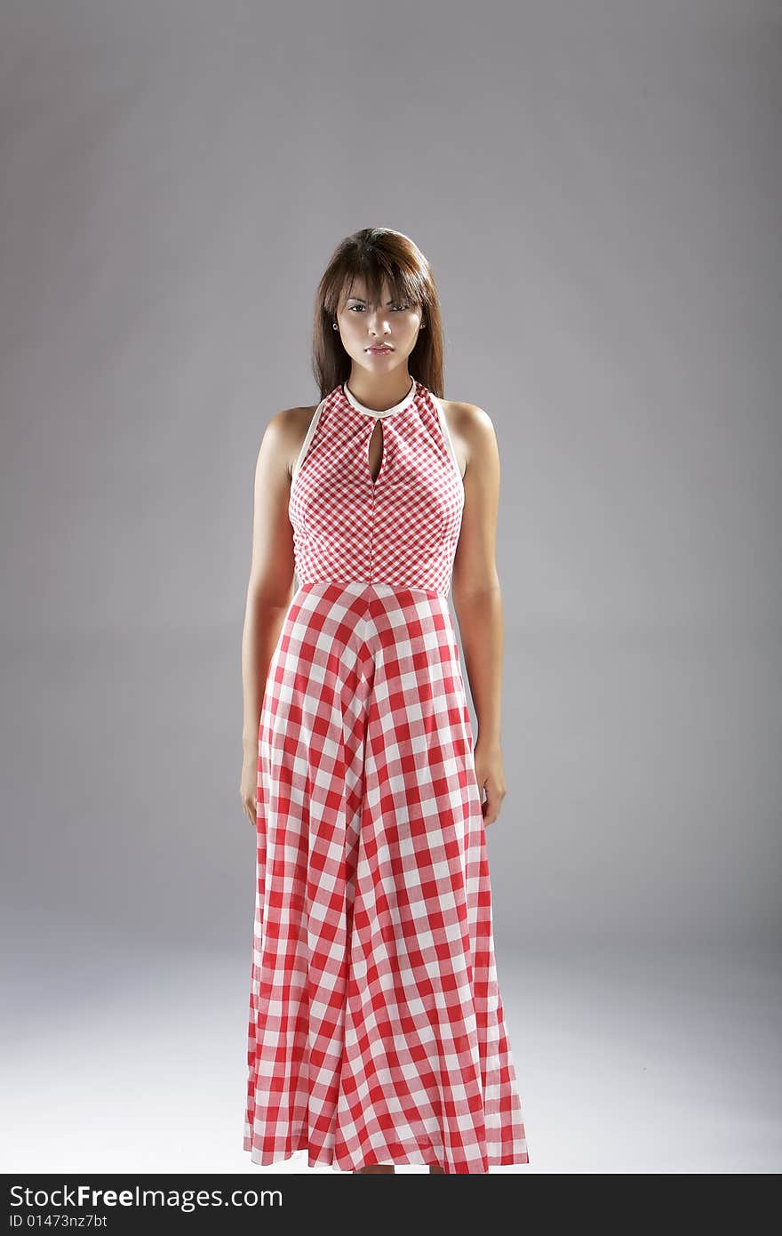 Fashion shot of a hispanic lady dressed in red. Fashion shot of a hispanic lady dressed in red