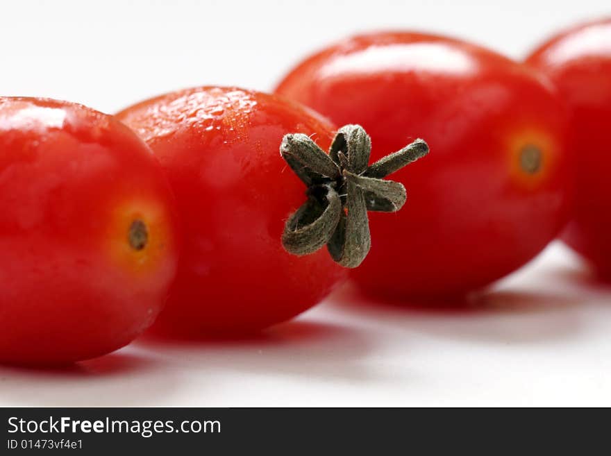 Mini cherry tomato isolated on white. Mini cherry tomato isolated on white