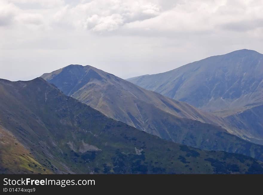 A view of Polish Tatra mountains on an overcast day