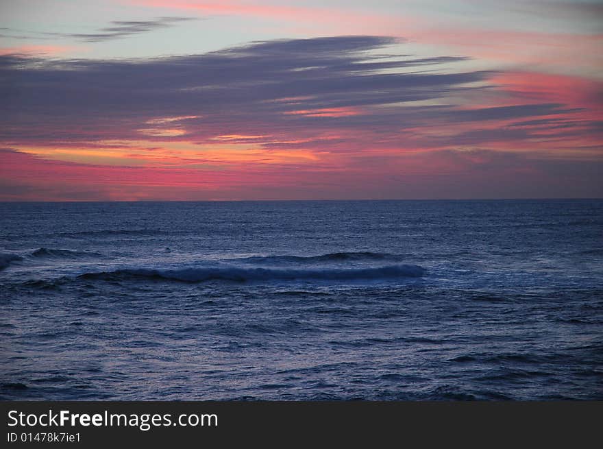 A sunset with the ocean. A sunset with the ocean