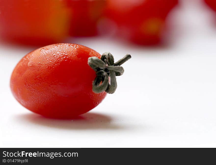 Mini cherry tomato isolated on white. Mini cherry tomato isolated on white