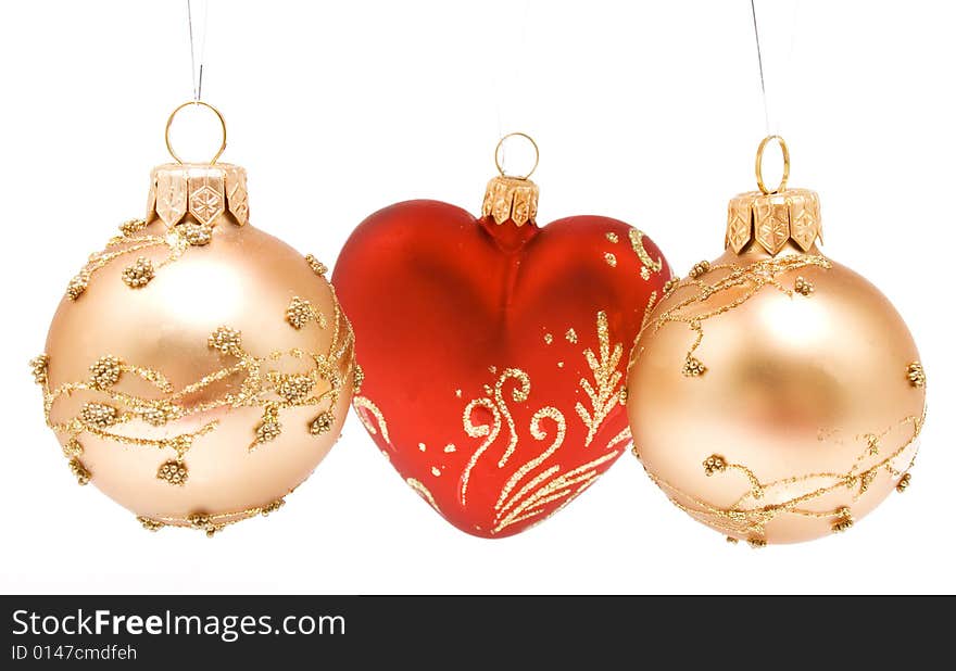 Some christmas balls isolated golden and red. Some christmas balls isolated golden and red