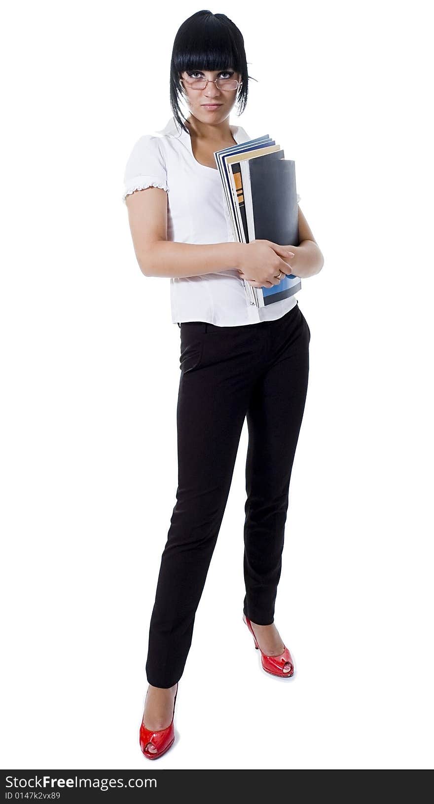 The student, a different angle view, with books, a pointer, the laptop, in points, standing and sitting, isolated on white. The student, a different angle view, with books, a pointer, the laptop, in points, standing and sitting, isolated on white