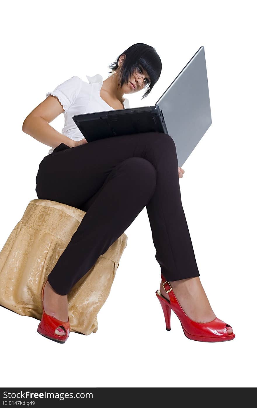 The student, a different angle view, with books, a pointer, the laptop, in points, standing and sitting, isolated on white. The student, a different angle view, with books, a pointer, the laptop, in points, standing and sitting, isolated on white