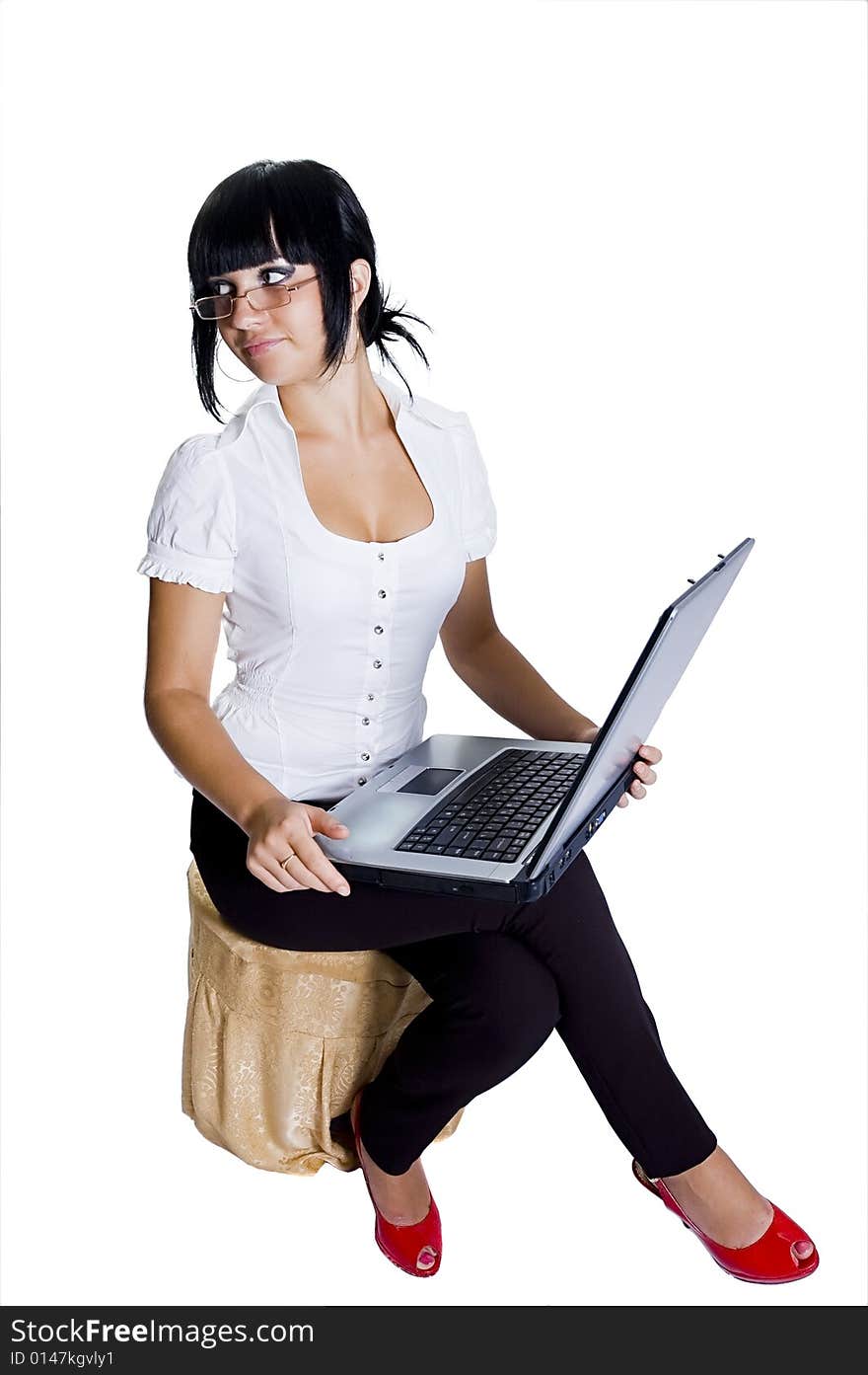 The student, a different angle view, with books, a pointer, the laptop, in points, standing and sitting, isolated on white. The student, a different angle view, with books, a pointer, the laptop, in points, standing and sitting, isolated on white