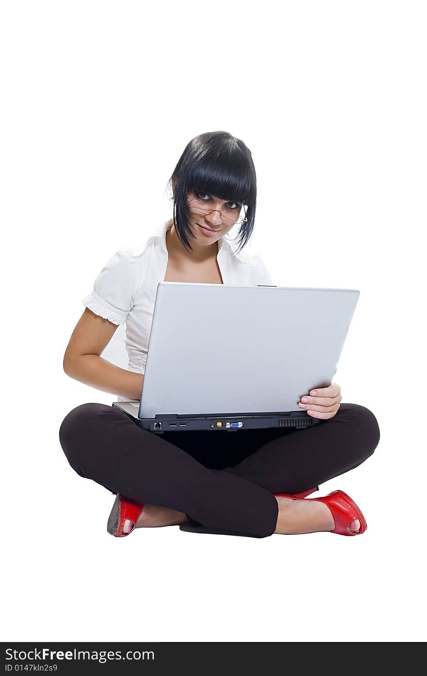 The student, a different angle view, with books, a pointer, the laptop, in points, standing and sitting, isolated on white. The student, a different angle view, with books, a pointer, the laptop, in points, standing and sitting, isolated on white