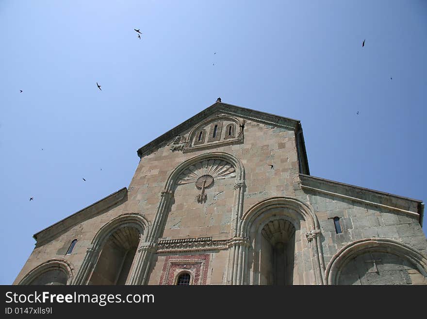 Georgian chapel and birds(Mzheta, Georgia). Georgian chapel and birds(Mzheta, Georgia)