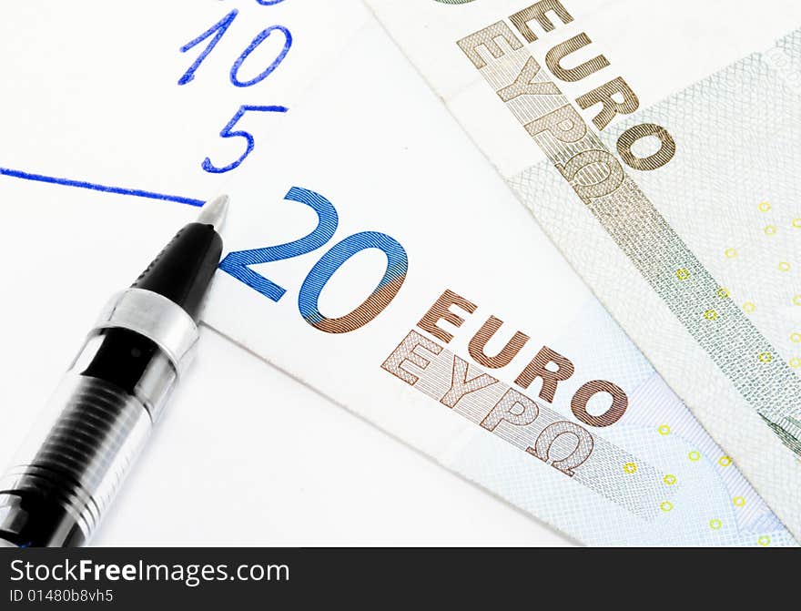 Financial calculations with euros - economics background - close up. Financial calculations with euros - economics background - close up