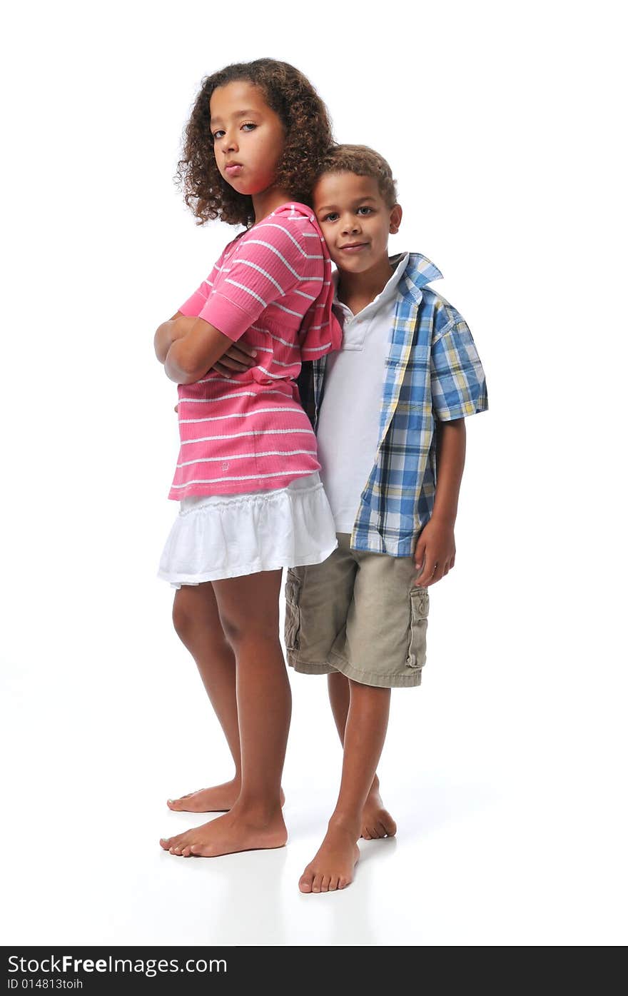 Brother and sister smiling isolated on white