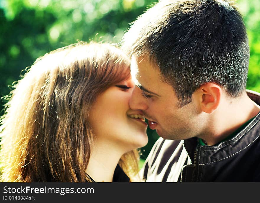 Young beautiful couple in the park. Young beautiful couple in the park.