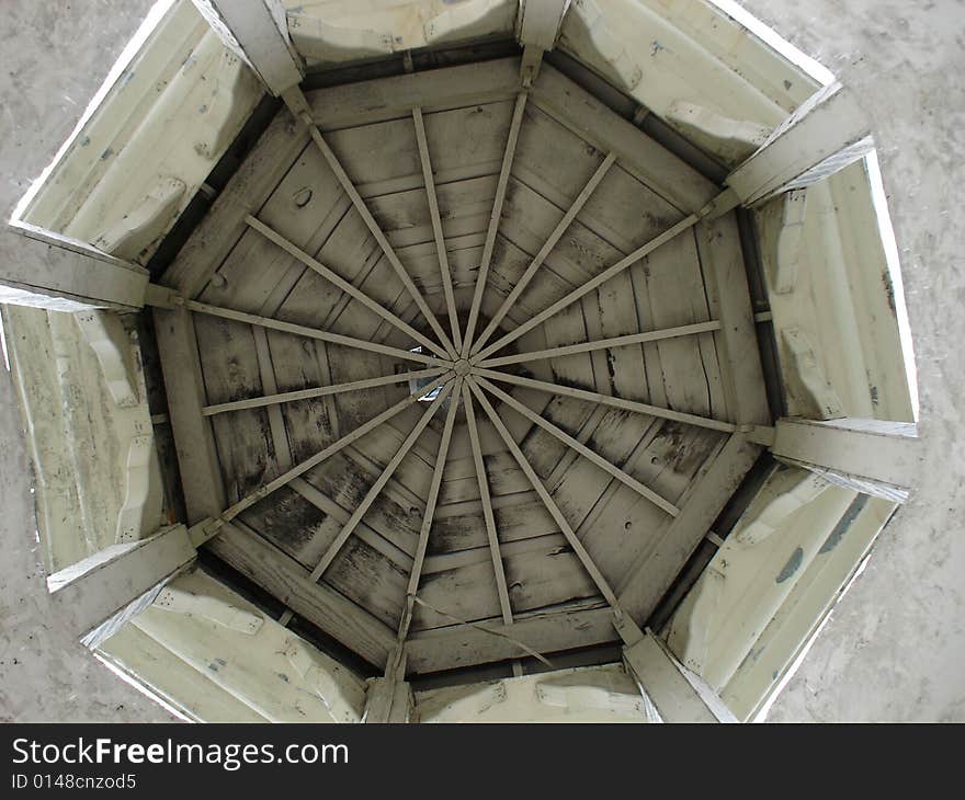 Looking upward in an old tower. Great detail in the center of the roof and the joints. Looking upward in an old tower. Great detail in the center of the roof and the joints.