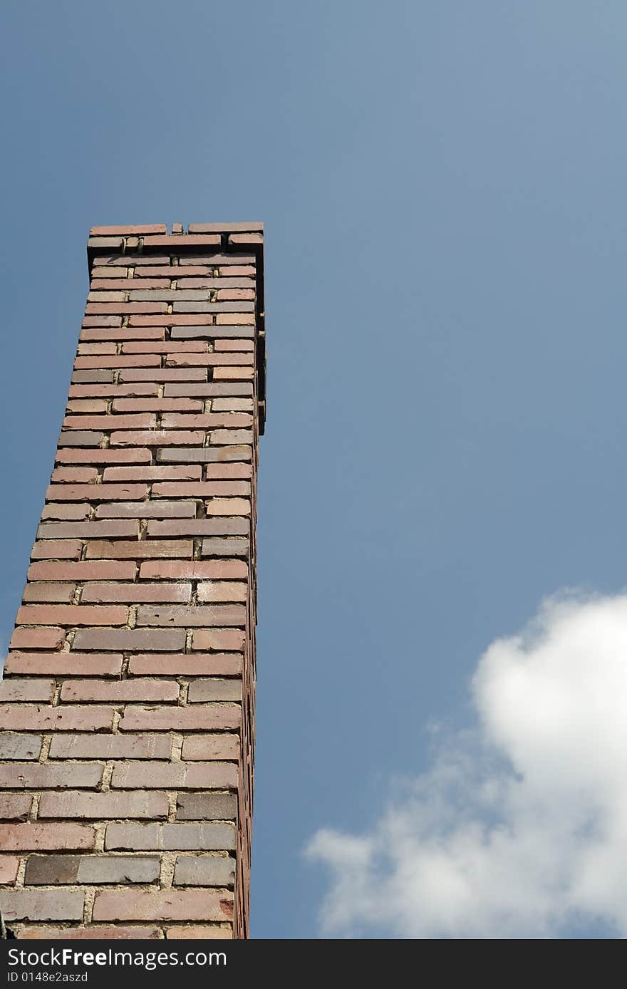 Old red brick chimney with sky and clouds. Old red brick chimney with sky and clouds