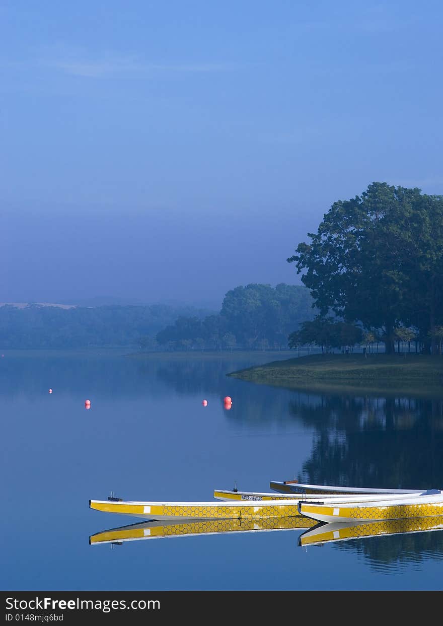 Racing Boats in Morning Lake