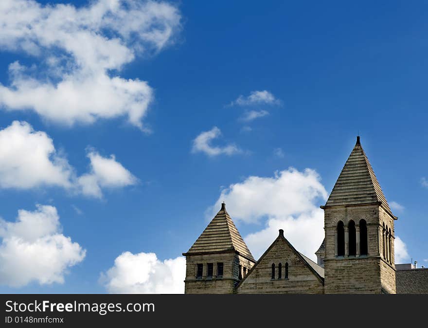 Top of a church on a bright blue sky