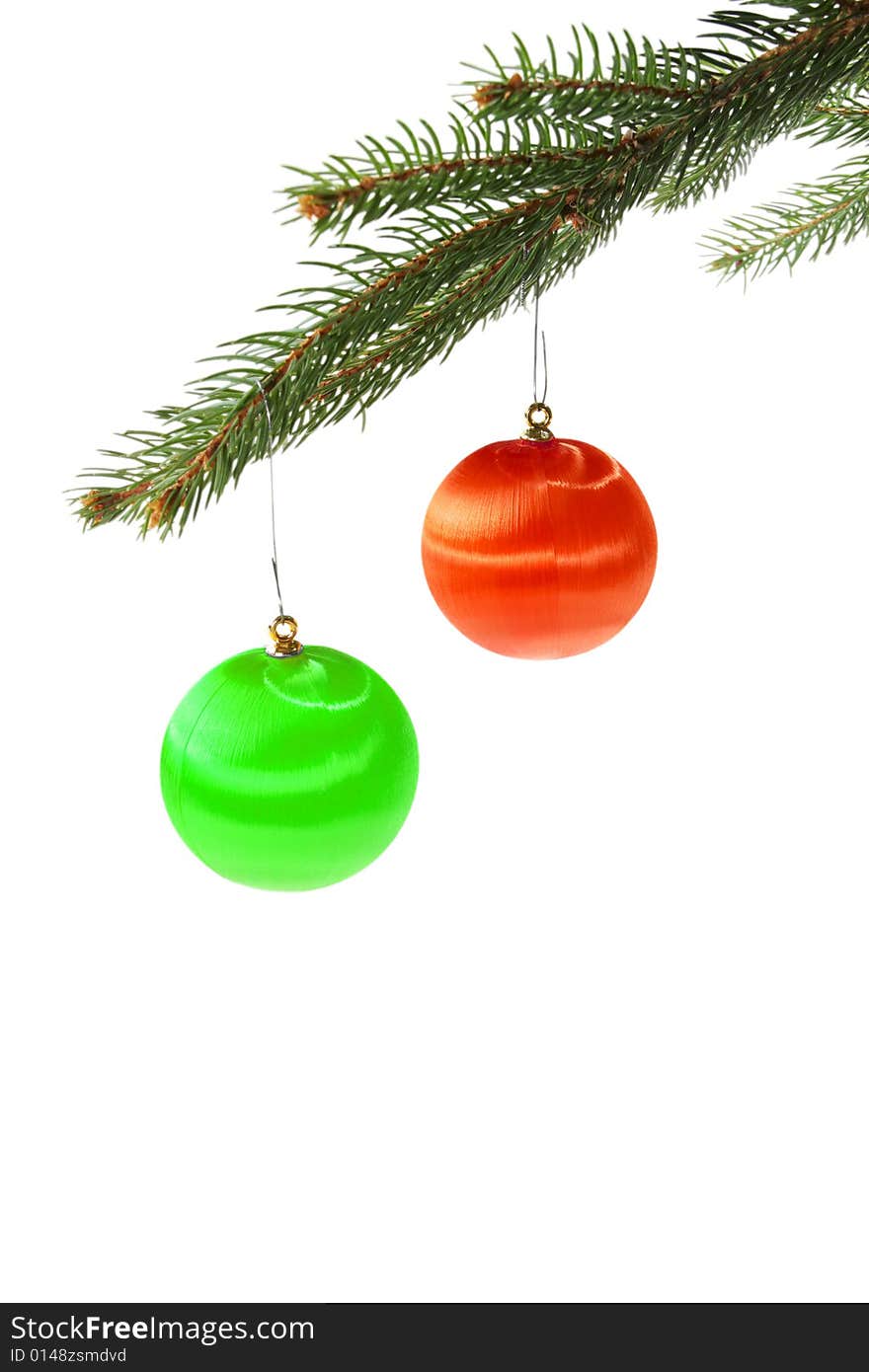 Colorful xmas balls on spruce branch