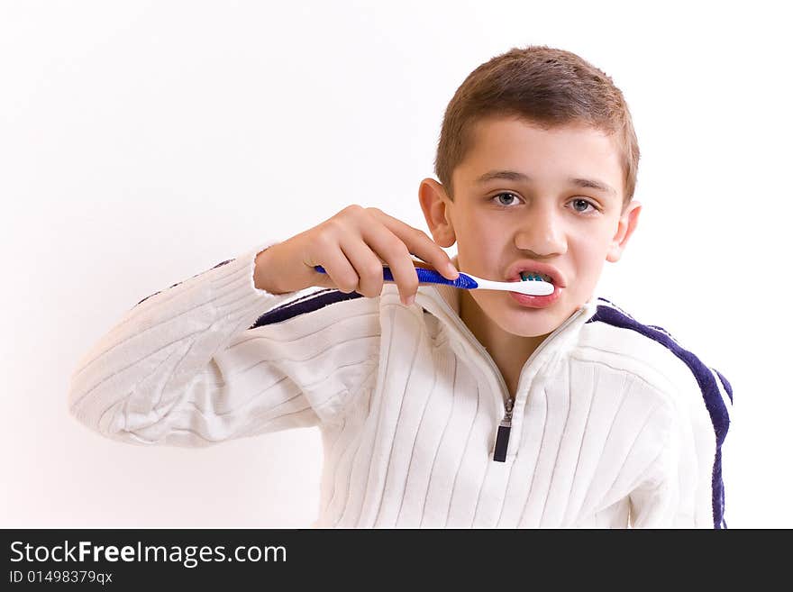 Young man with brush in hand. Young man with brush in hand