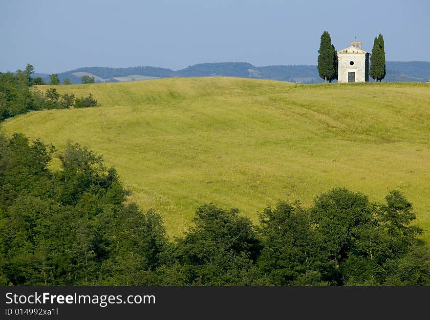 TUSCANY countryside with cypress and farm