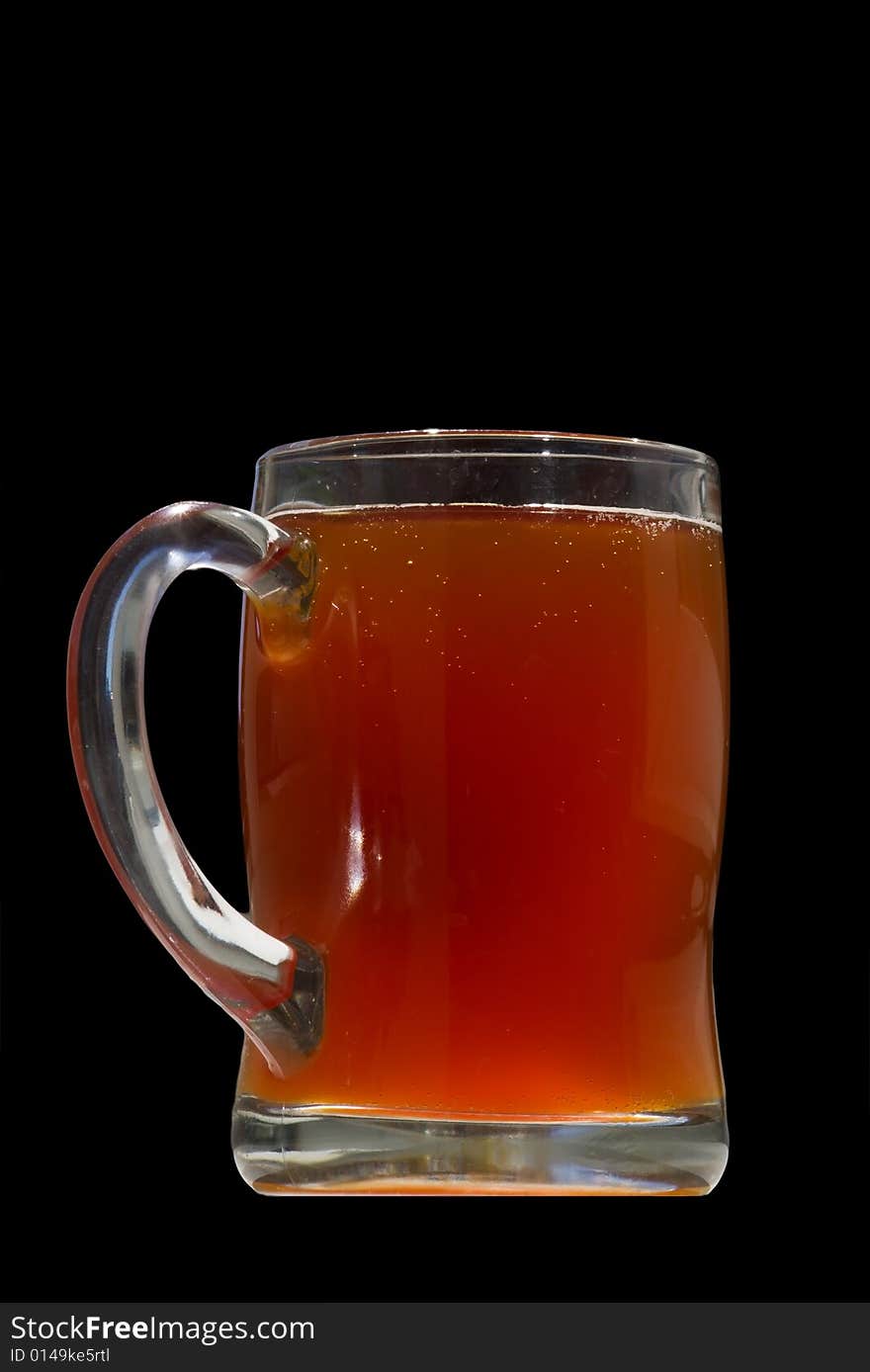 Mug of kvass isolated on black. Mug of kvass isolated on black