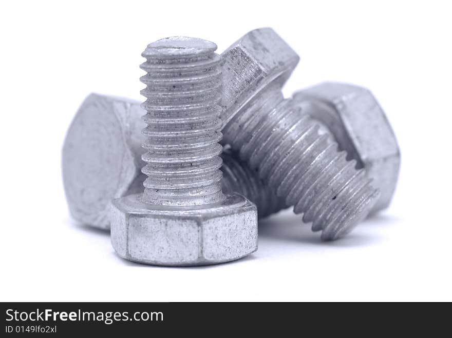 Metal bolts composition on white background