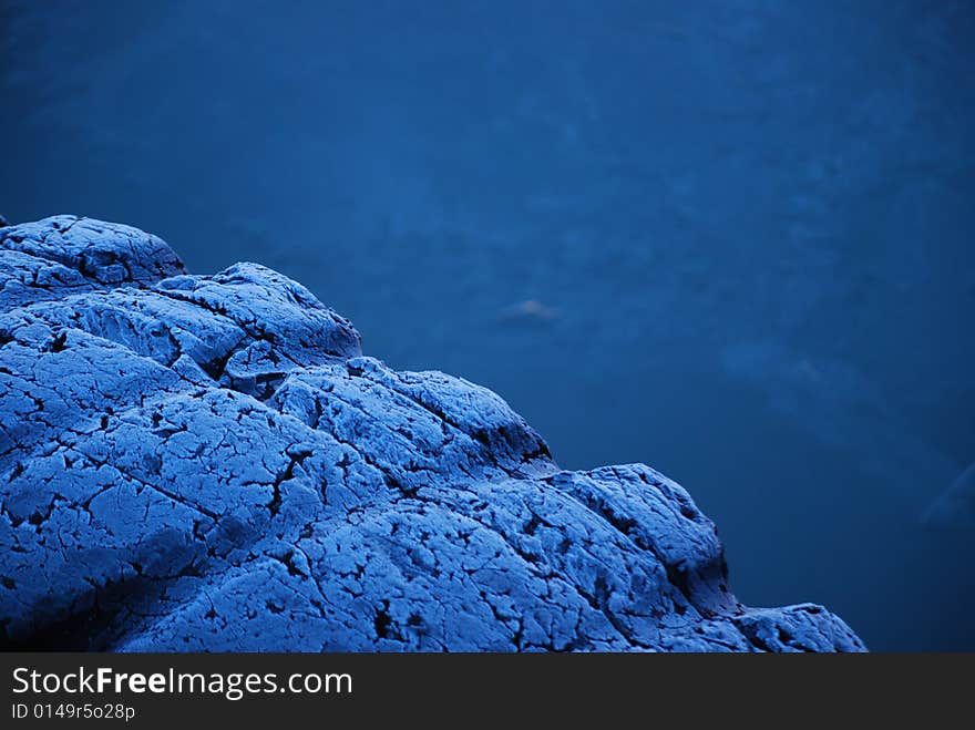 Photo taken early morning of a tire hanging in the docks in Vänersborg, Sweden. Ice in the background. Photo taken early morning of a tire hanging in the docks in Vänersborg, Sweden. Ice in the background.