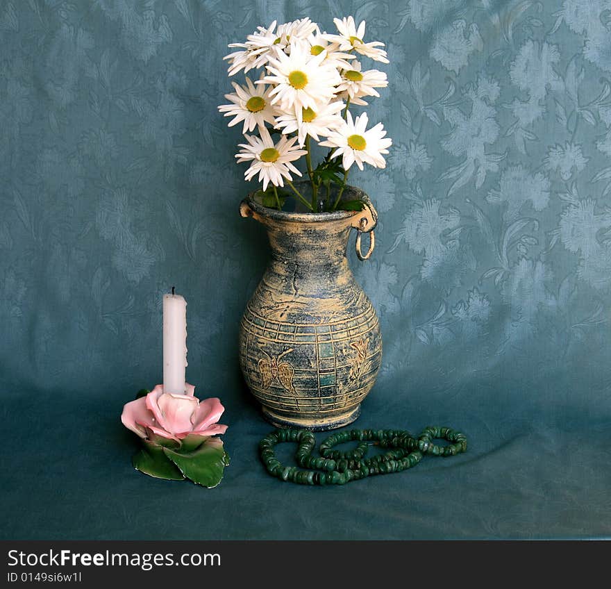 Vase with Daisies, Candlestick and Necklace as Still Life. Vase with Daisies, Candlestick and Necklace as Still Life