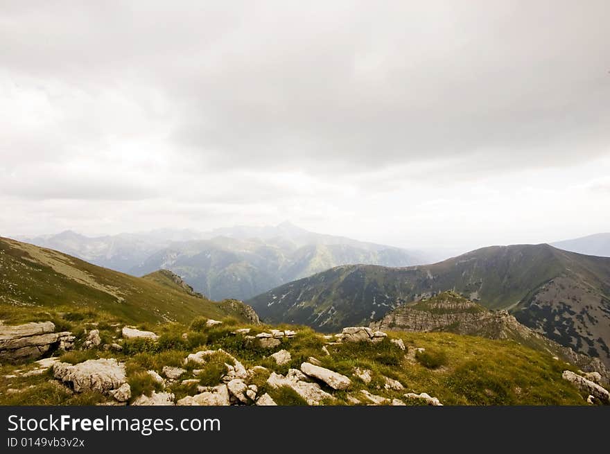 A view of Polish Tatra mountains on an overcast day