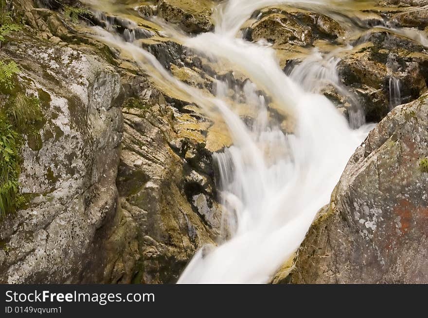 Mountain waterfall in Polish Tatra region