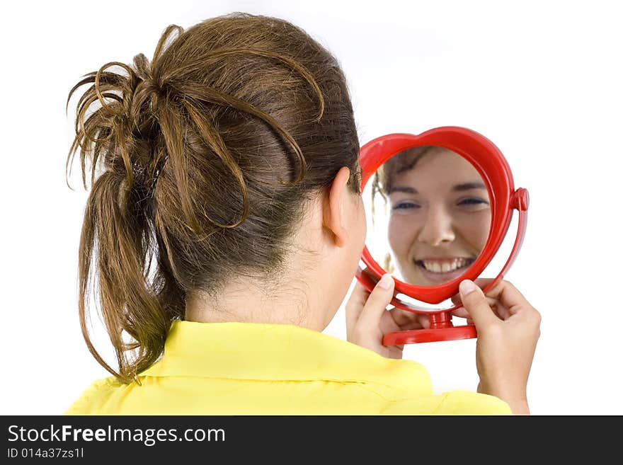 Girl and mirror isolated on white background