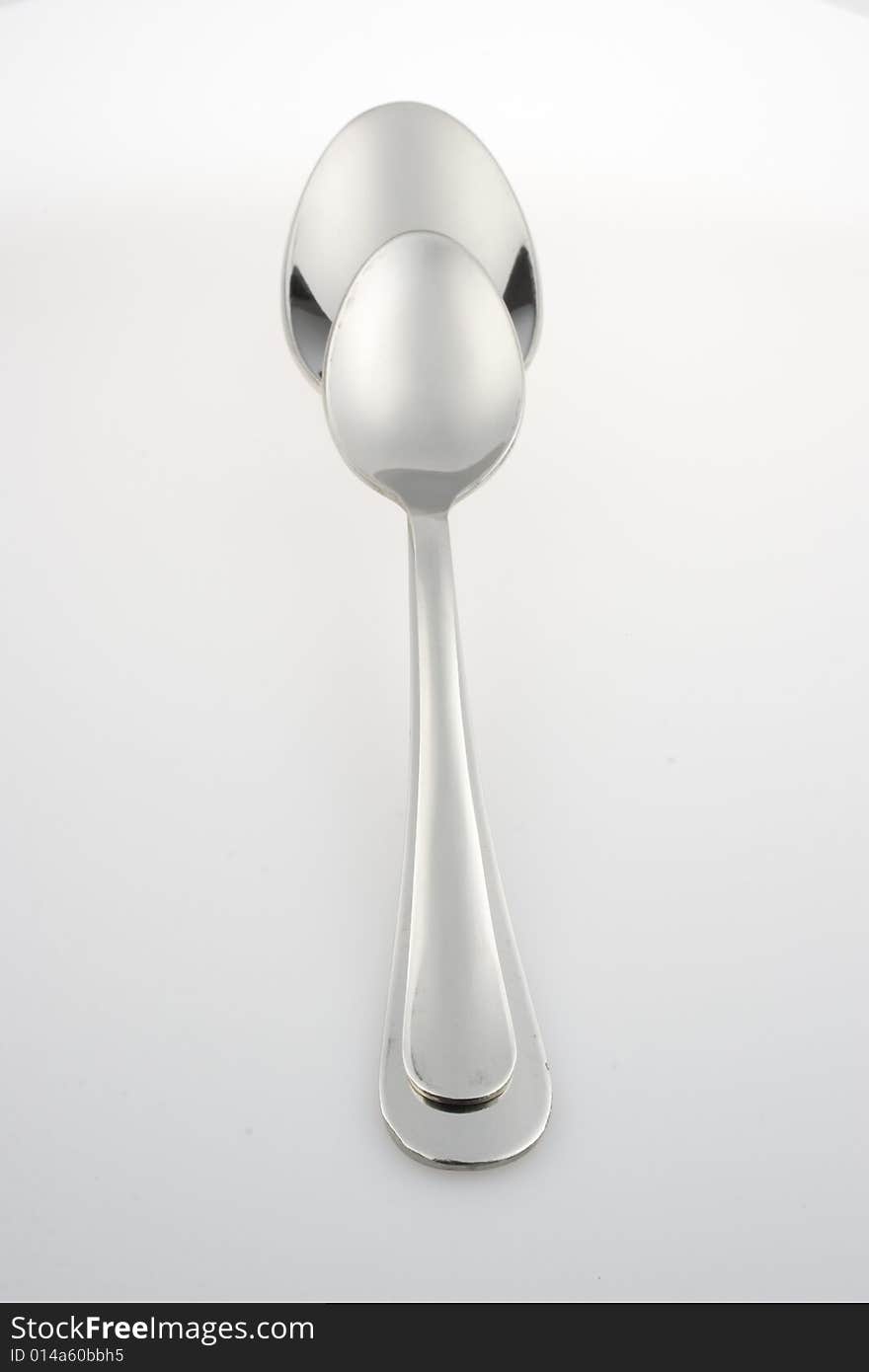 Lustrous spoon on light plane