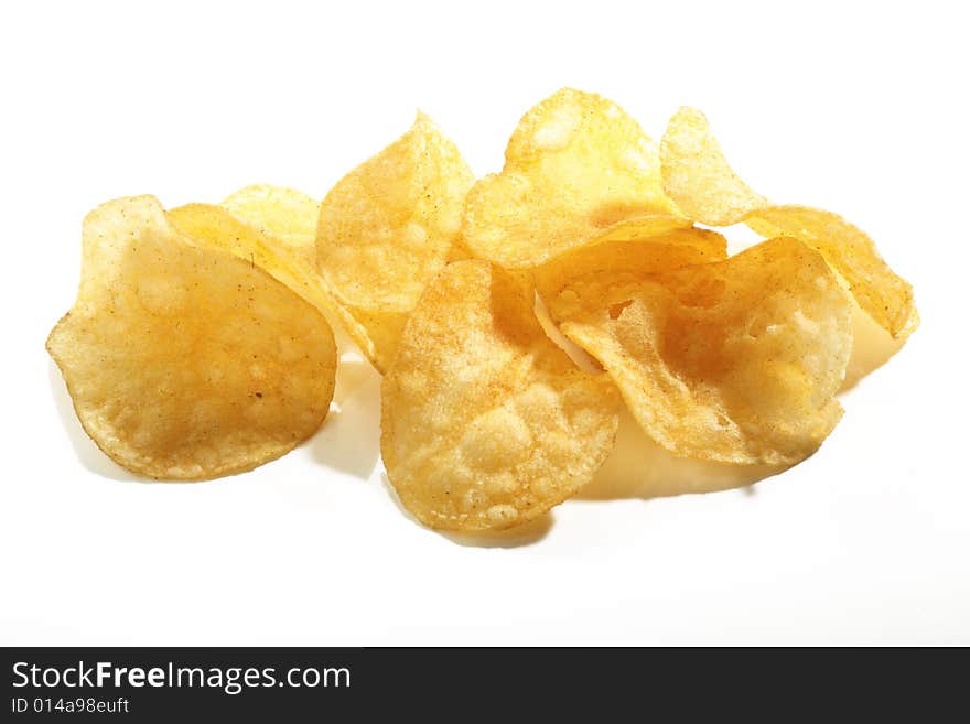 Crunchy potato chips composition isolated. Crunchy potato chips composition isolated